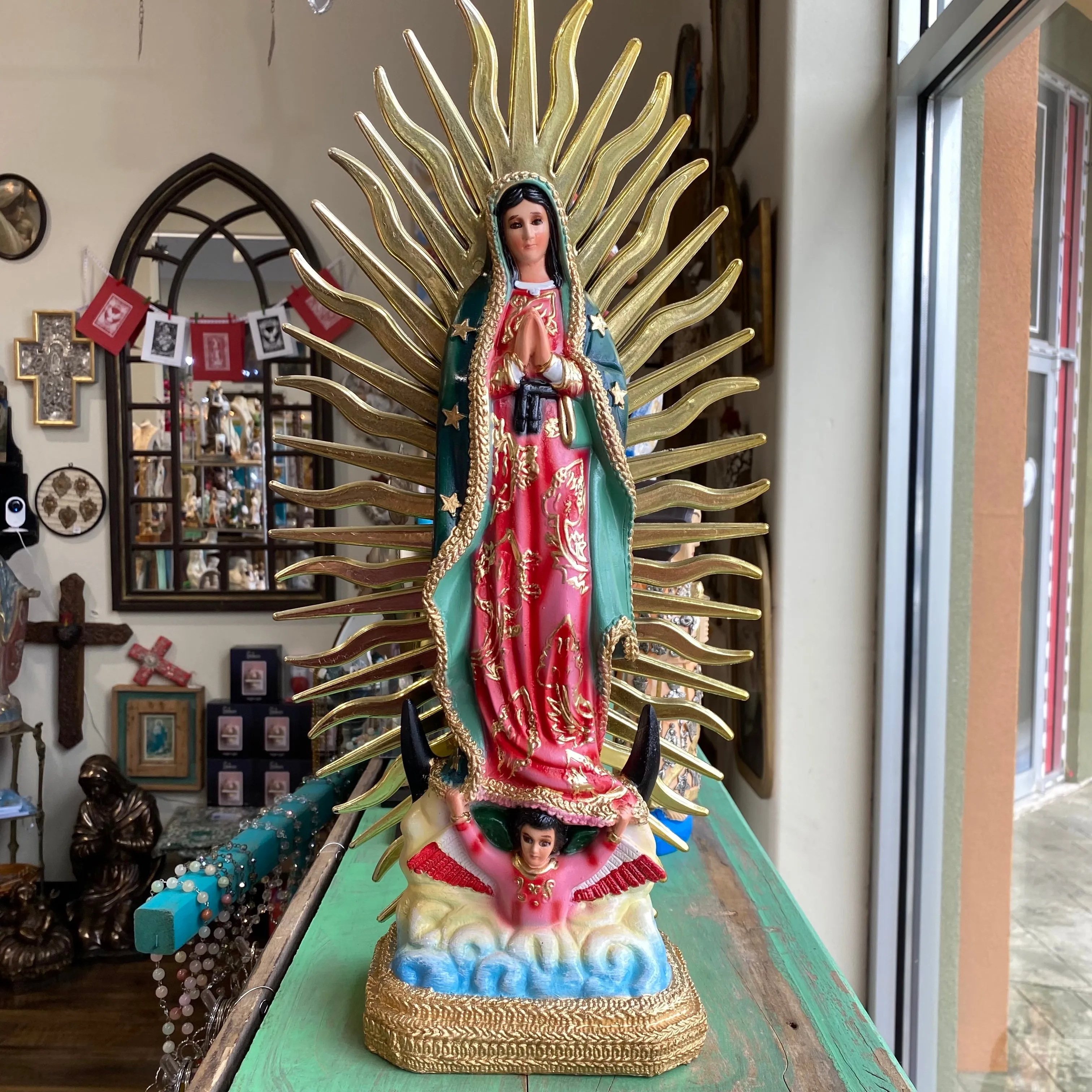 Colorful OLG Statue with Rays