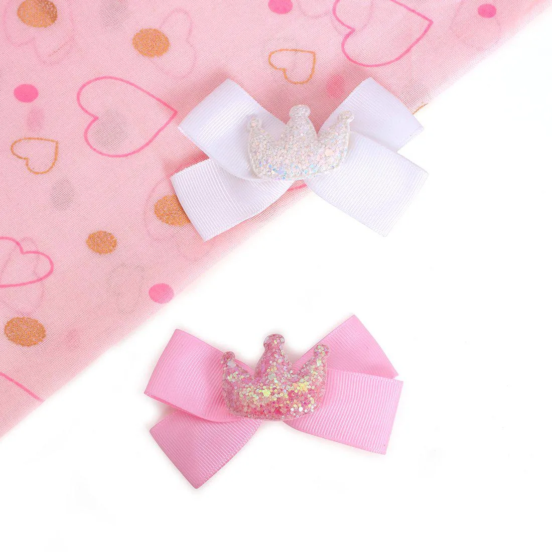 SET OF TWO BOW CROWN HAIR PINS